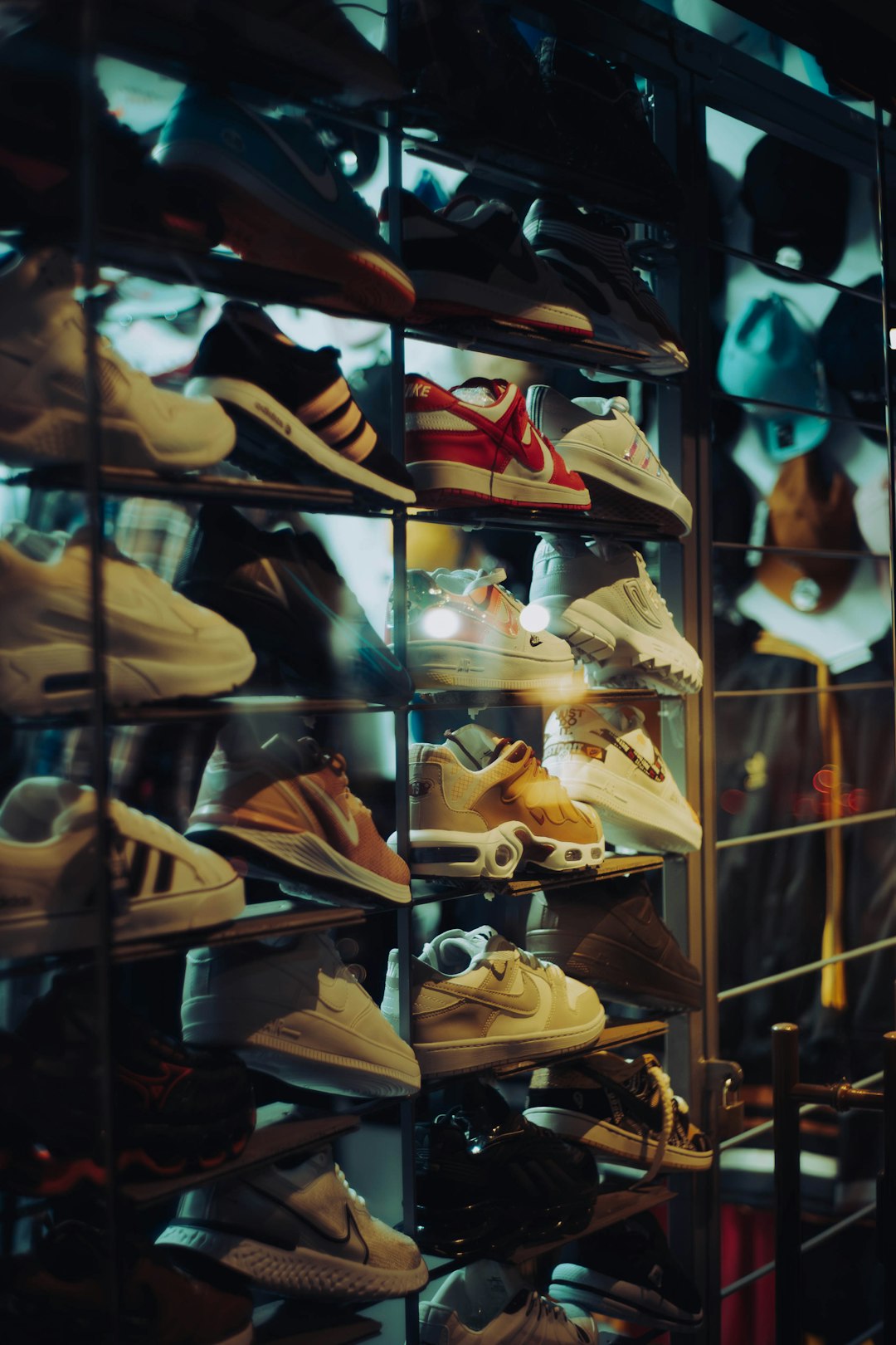 FAQ: Your Burning Footwear Questions Answered ❓ by Popular Brands a display case filled with lots of shoes