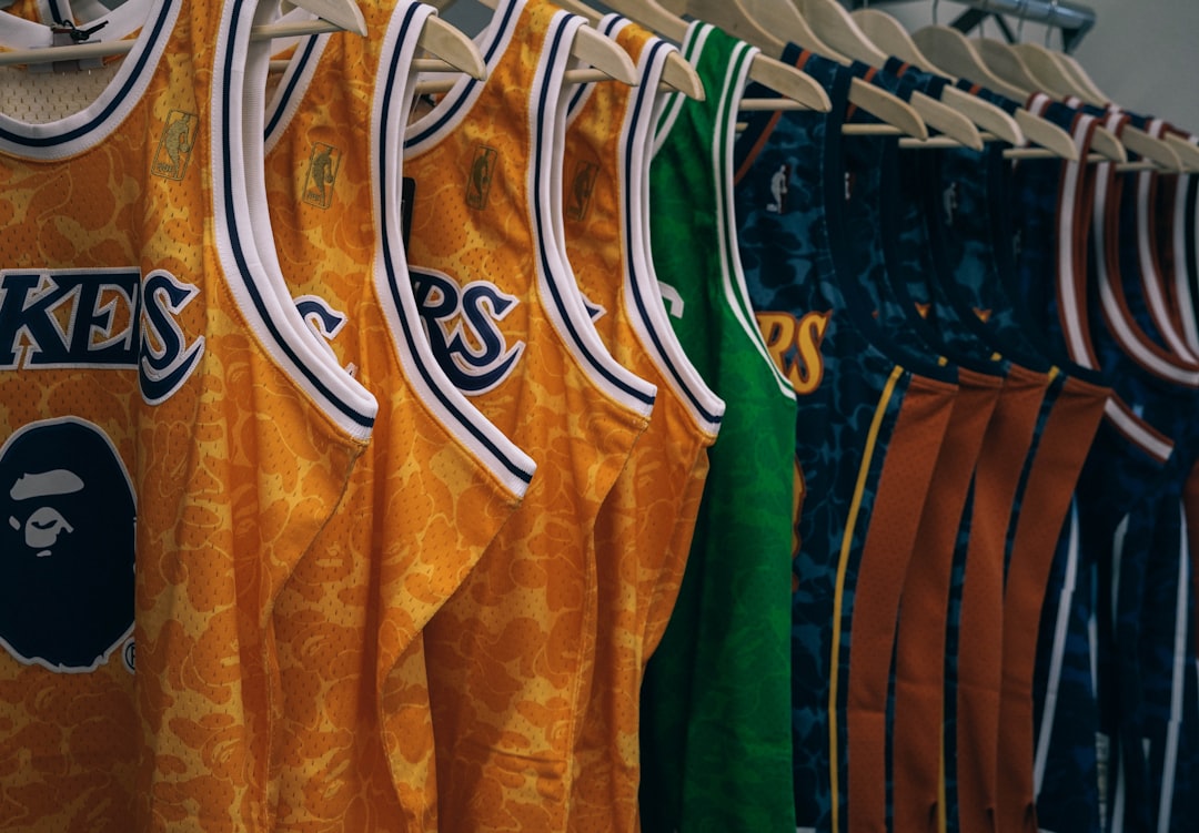 Top 100 clothing brands by Popular Brands assorted NBA jerseys hanged on clothes hangers