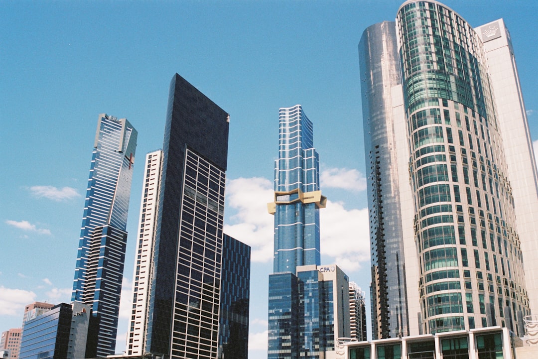 Conclusion by Popular Brands white and black high rise buildings under blue sky during daytime