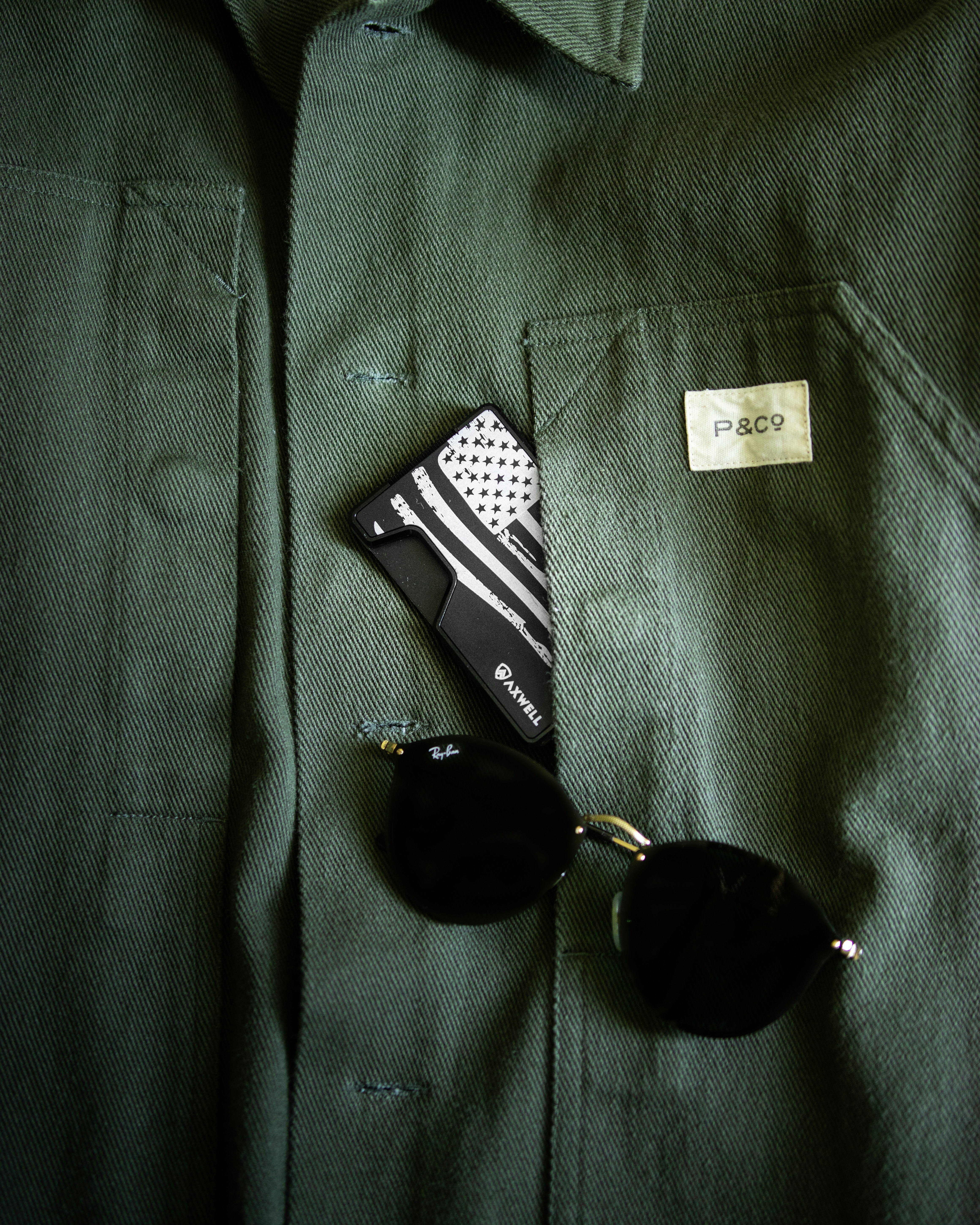 a suit with a tie and a tag on it